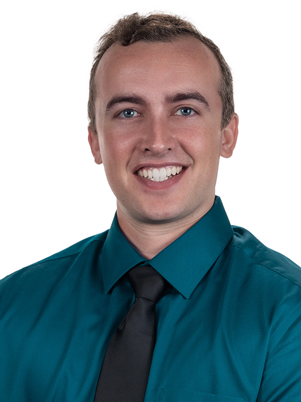 Professional headshot of Ryan Miller in blue to green gradient overlay.